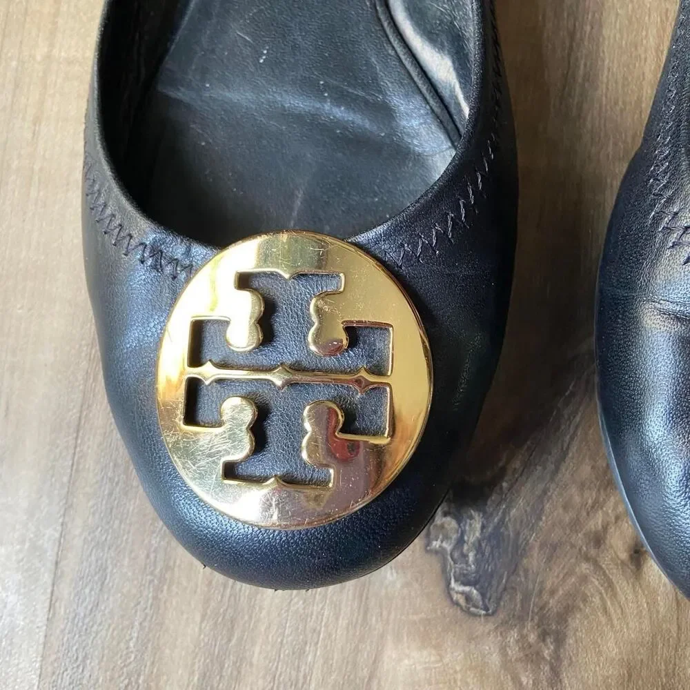 Tory Burch black leather gold tone logo scrunch ballet flats